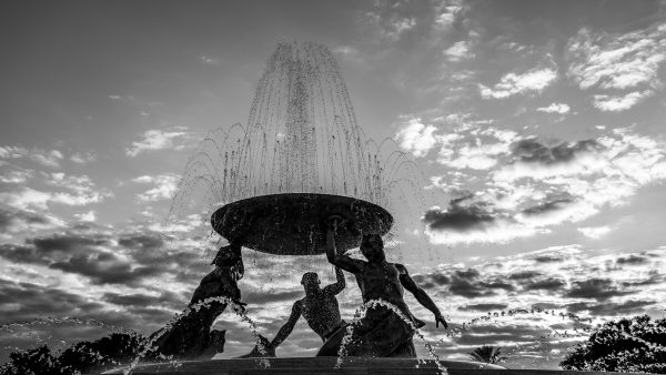 Triton Fountain photography, Valletta fine art, black and white fountain photos, Maltese cultural photography, iconic fountains in Malta, monochrome architectural photography, Mediterranean sculpture art, timeless fountain photos, luxury wall art, Valletta landmarks, fine art historical photography, dramatic black and white prints, Maltese fine art prints, collectible monochrome photography, symbolic Mediterranean art, water sculpture photography